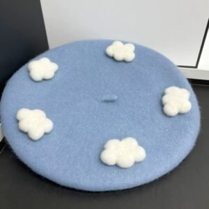 cloudy colorful beret on the dark grey table