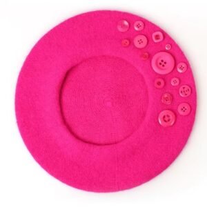 fuchsia colorful beret with buttons on the white background