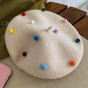 colorful dots beret on the brown table