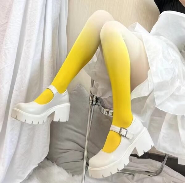 woman wearing yellow colorful gradient tights and white shoes and a white dress