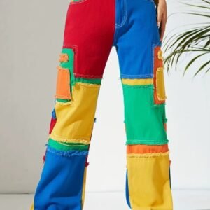 woman wearing colorful jeans in the white room