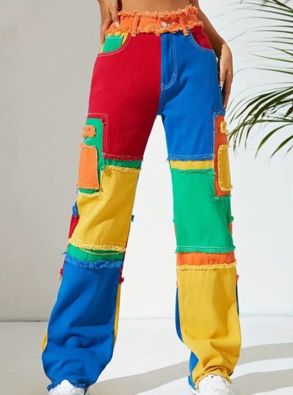 woman wearing colorful jeans in the white room