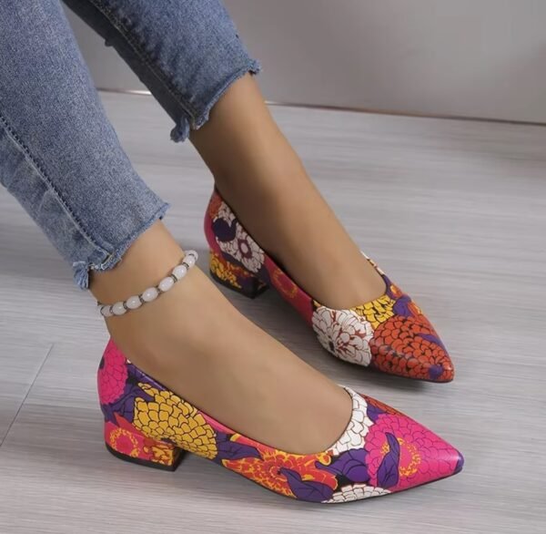 woman wearing pink colorful pattern flats