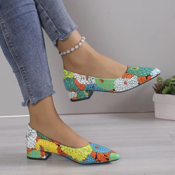 woman wearing green colorful pattern flats and exposing their side