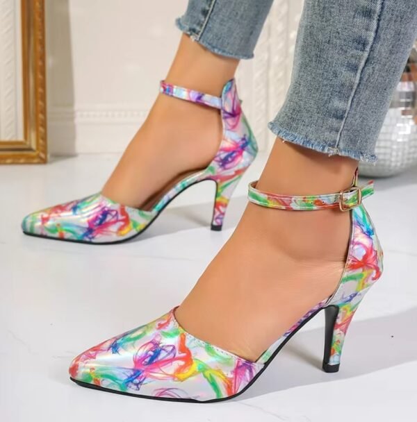 woman standing in colorful pattern heels exposing their side