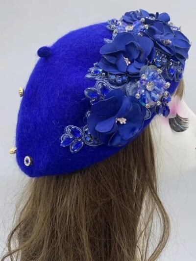 blue fancy colorful beret on a mannequin