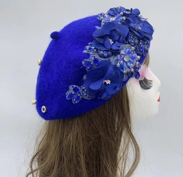 blue fancy colorful beret on a mannequin