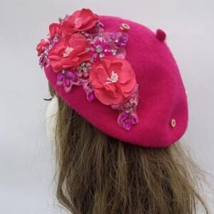 pink fancy colorful beret on a mannequin