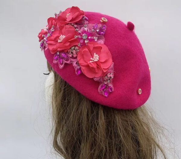 pink fancy colorful beret on a mannequin