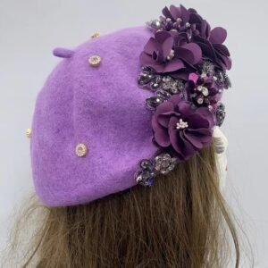 purple fancy colorful beret on a mannequin