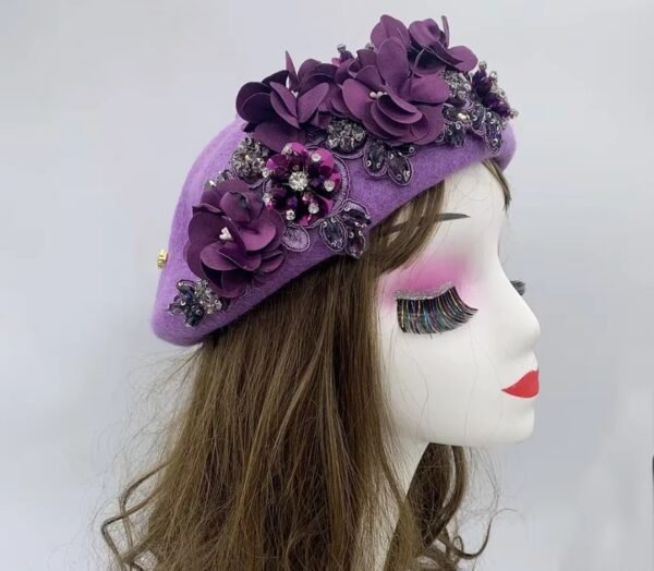 the side view of purple fancy colorful beret on a mannequin