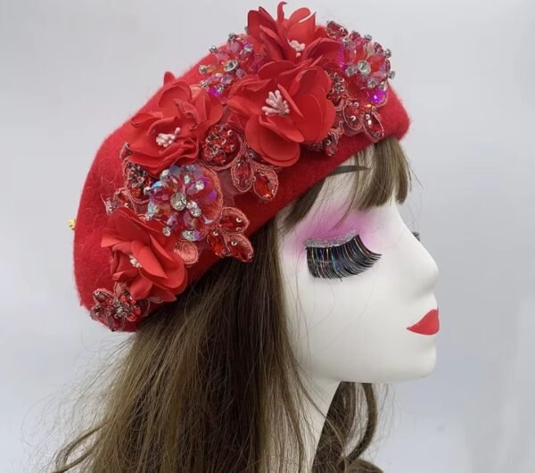 red fancy colorful beret on a mannequin