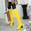 woman wearing yellow boots