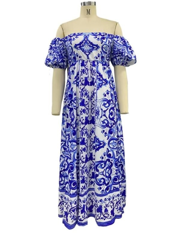 blue colorful bohemian dress on a mannequin, white background