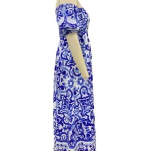 side view of blue colorful bohemian dress on a mannequin, white background