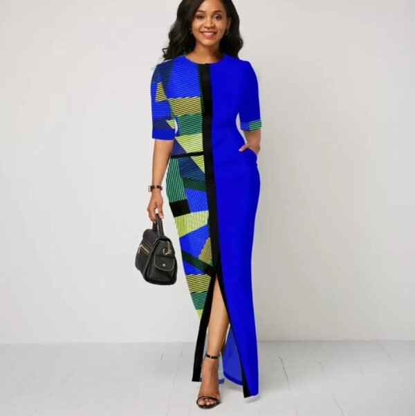 woman wearing blue colorful dress for woman and a black bag, white wall behind her