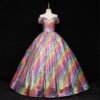 colorful ball gown on a a mannequin, black background