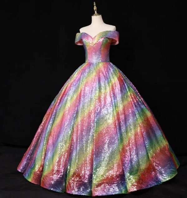 side view of colorful ball gown on the black background