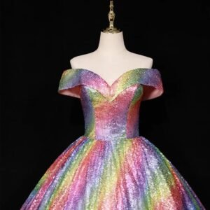 upper part of colorful ball gown on a mannequin, black background