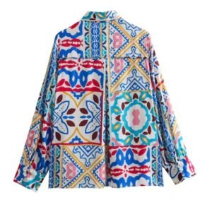 back view of colorful boho blouse on the white background