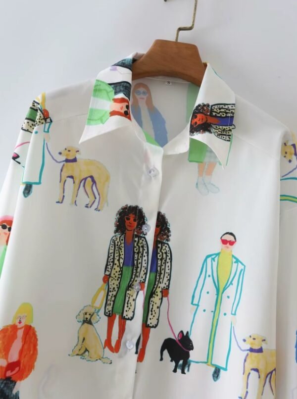 collar and upper part of colorful characters blouse on a hanger