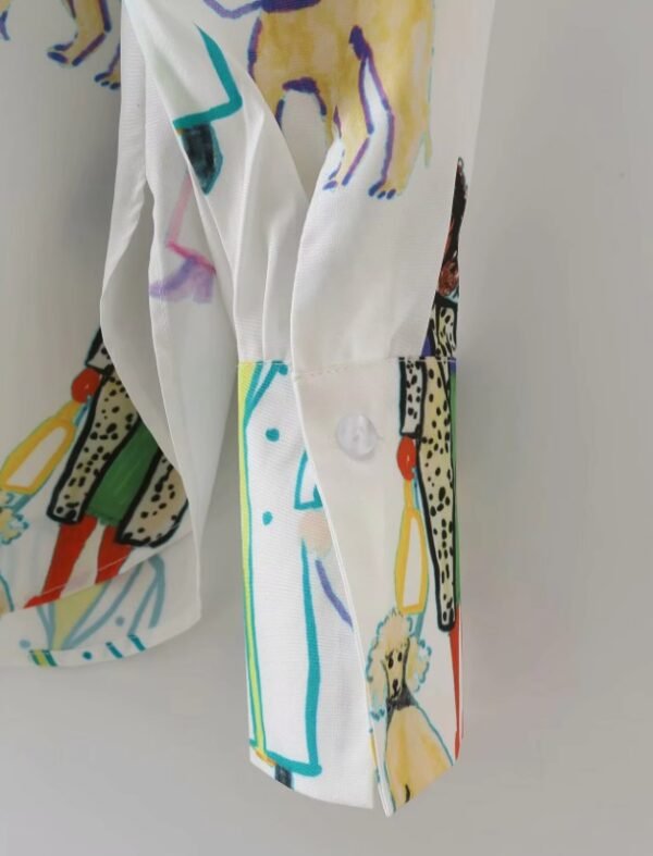 the sleeve of colorful characters blouse on the white background