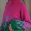 woman wearing colorful color blocking sweater