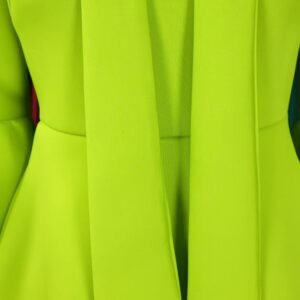 waistline of green colorful dress with a bow