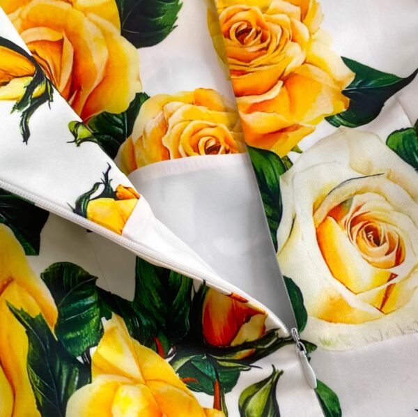 zipper of colorful dress with yellow roses