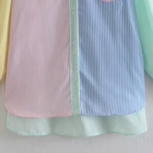 bottom part of colorful pastel blouse on the white backgorund