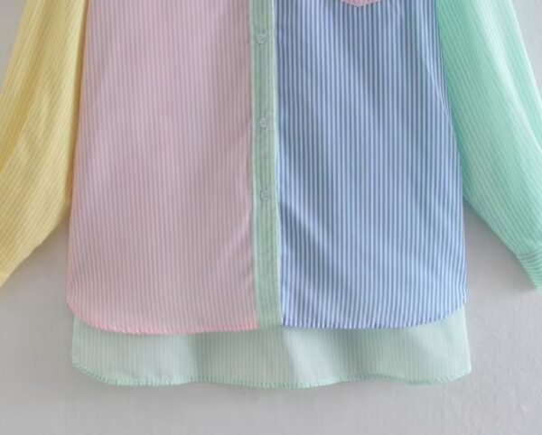 bottom part of colorful pastel blouse on the white backgorund