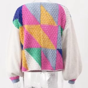 back view of colorful patchwork cardigan on a mannequin