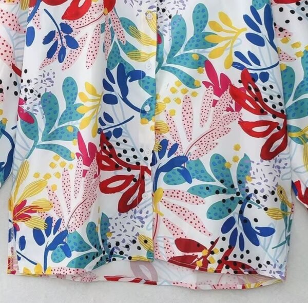 the bottom part of colorful print blouse