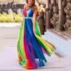 woman wearing colorful prom dress and smiling