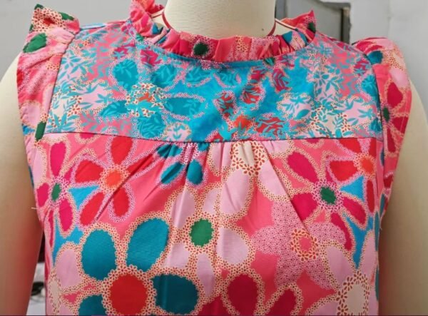 the upper part of colorful sleeveless blouse