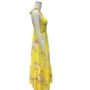 sideview of colorful sleeveless dress on a mannequin, white background