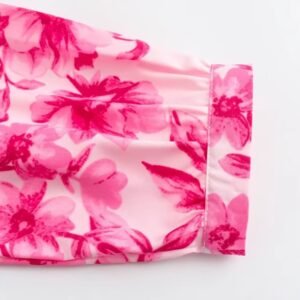 the sleeve of colorful spring blouse on the white background