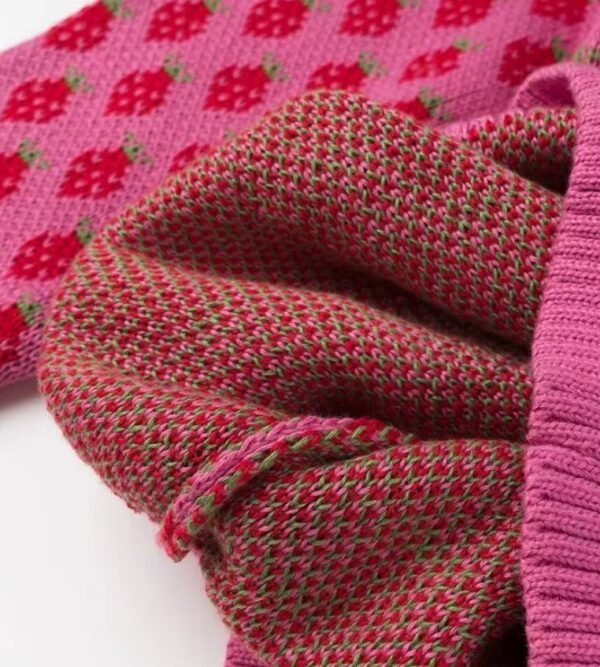 inside material of colorful strawberry sweater