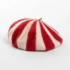 red colorful striped beret on the white background