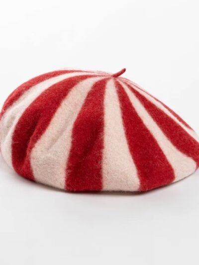 red colorful striped beret on the white background