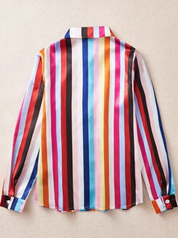 back side of colorful striped blouse on the beige background