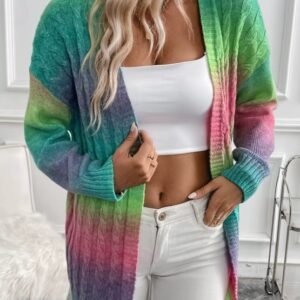 blonde woman wearing colorful tie dye cardigan, white top and white jeans