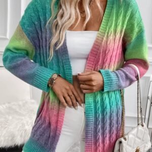 woman wearing colorful tie dye cardigan and holding its edge