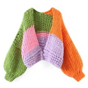 colorful winter cardigan on the white background