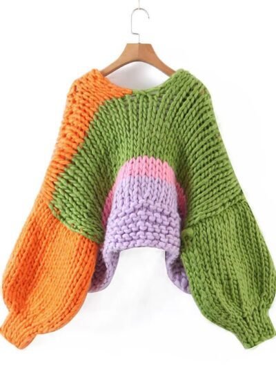 back view of colorful winter cardigan on the white background