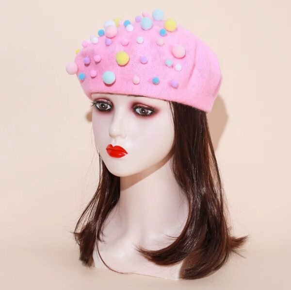 cute colorful beret on a mannequin