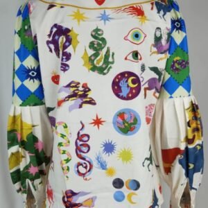 back view of fancy colorful blouse on a mannequin