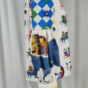 side view of fancy colorful blouse on a mannequin