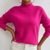 woman wearing fuchsia sweater