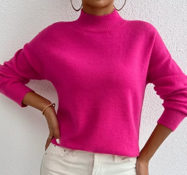 woman wearing fuchsia sweater